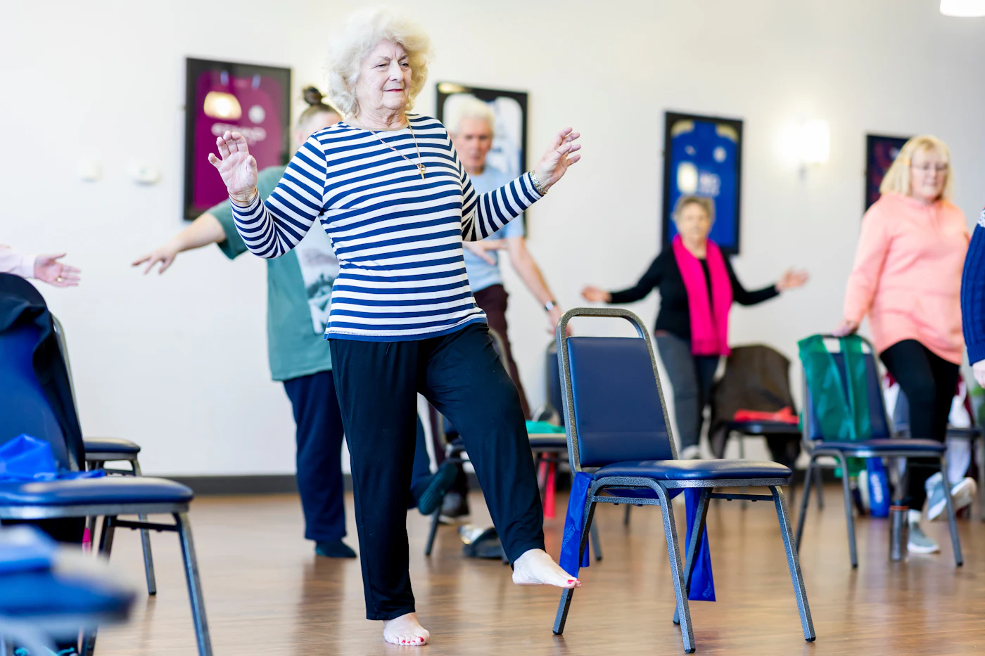 Gail leading a Steady session with members holding onto chairs
